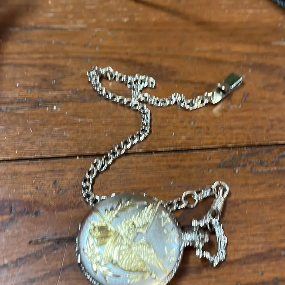 Eagle boa and pocket watch